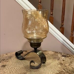 Glass Amber Hurricane Candle Holder with Black/Bronze Metal Scroll Base